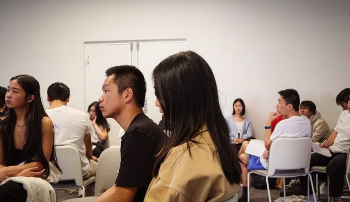 Grads listening intently during a talk at Connect